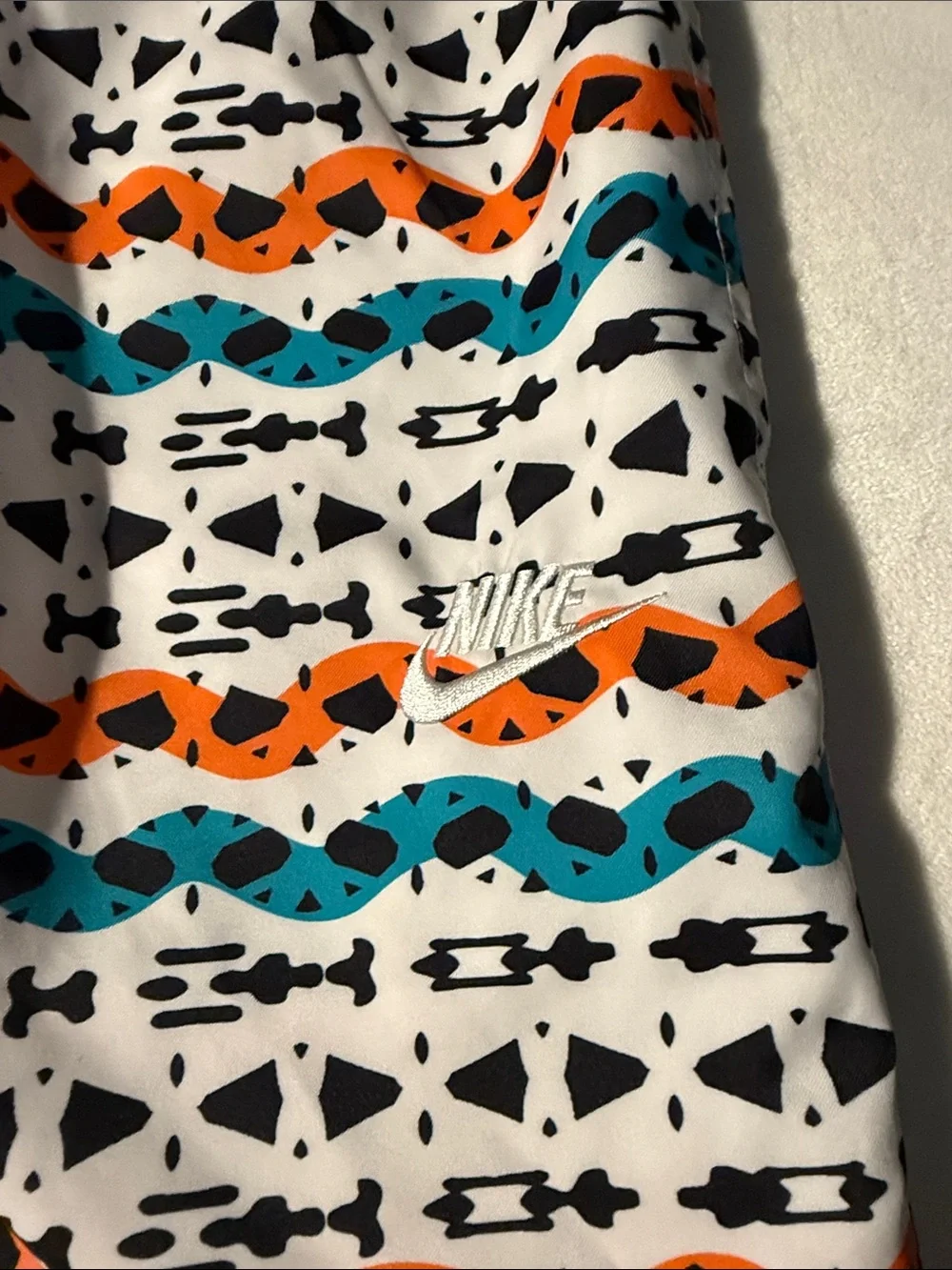 Nike N7 line White Swim Shorts with Teal, Orange & Black Tribal Pattern